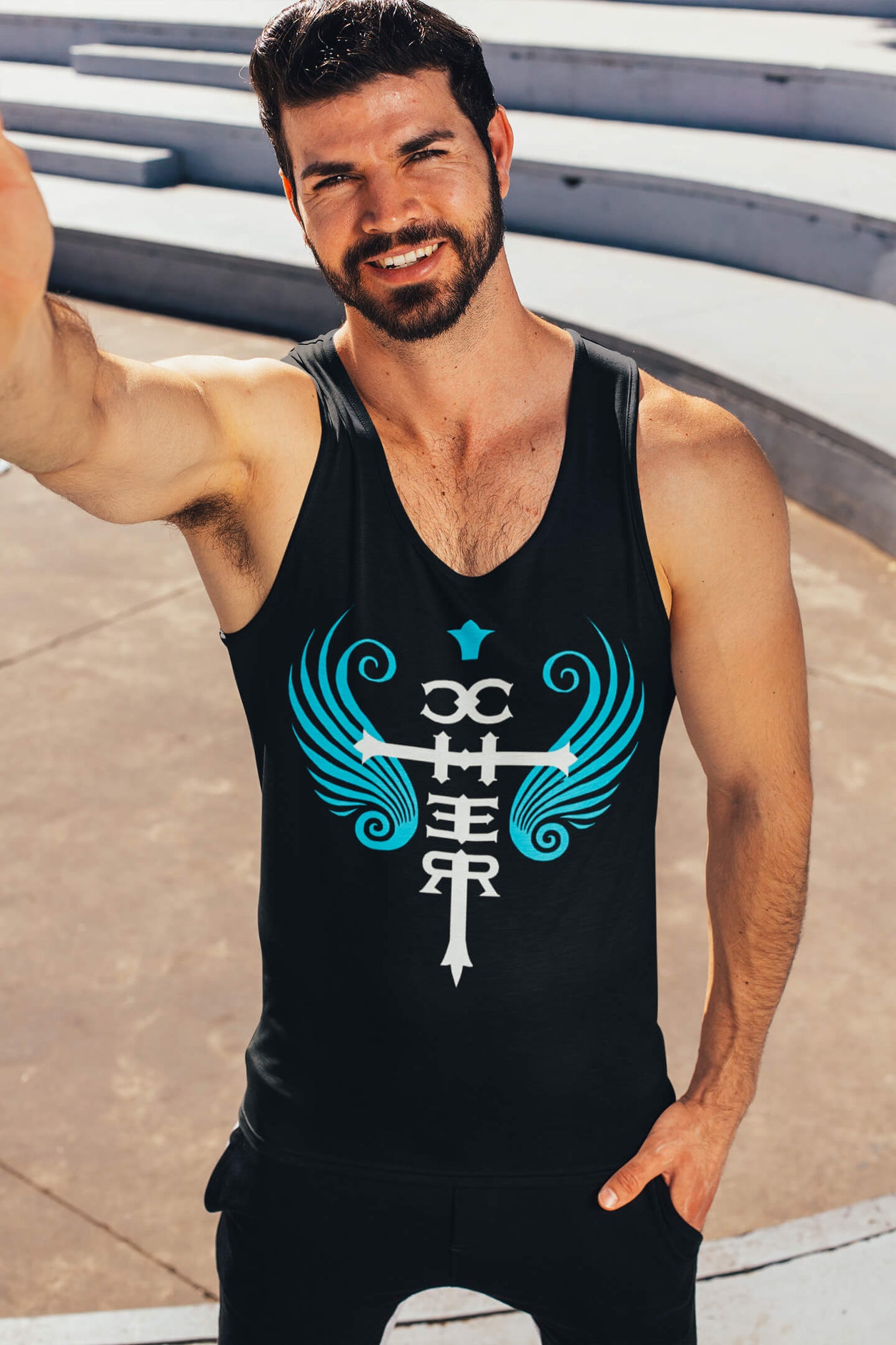 Muscular, bearded gay man wearing the Cher Fan Club Tank Top by Gllamazon.
