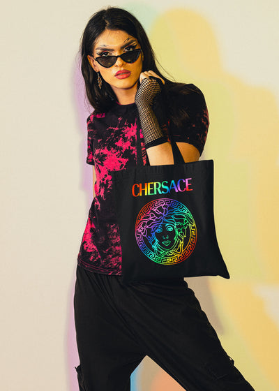 CHERSACE tote bag by Gllamazon featuring a trans woman with graphic eye makeup