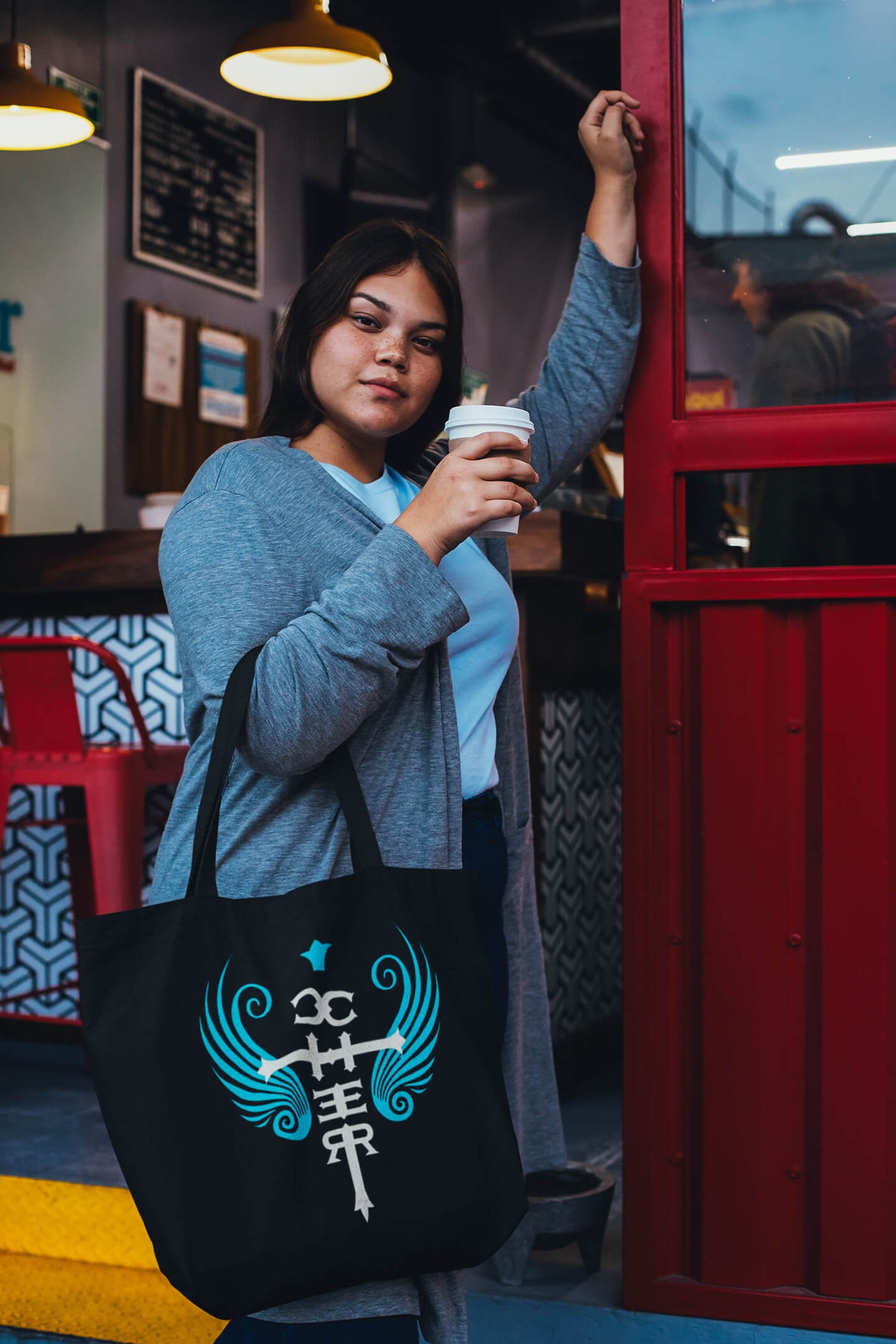 Woman wearing Cher Fan Club's Cherology Eco Tote Bag by Gllamazon.